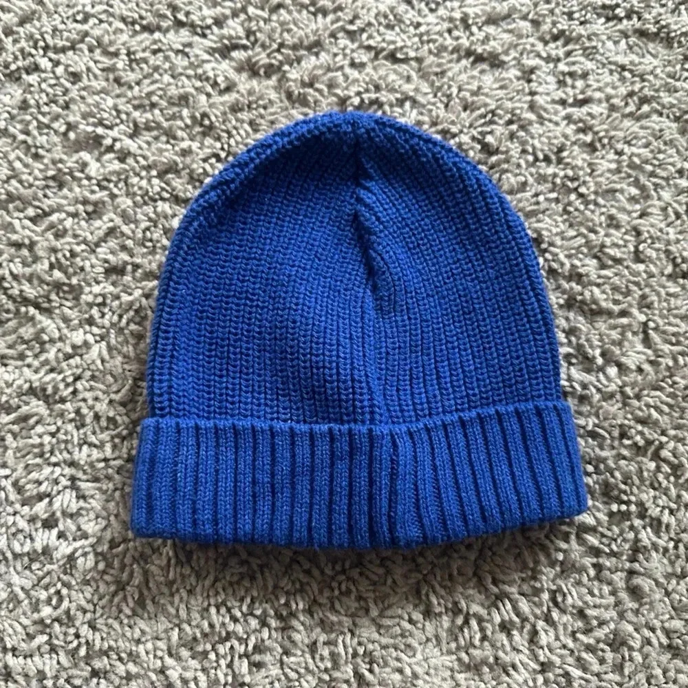 Brand new blue beanie.